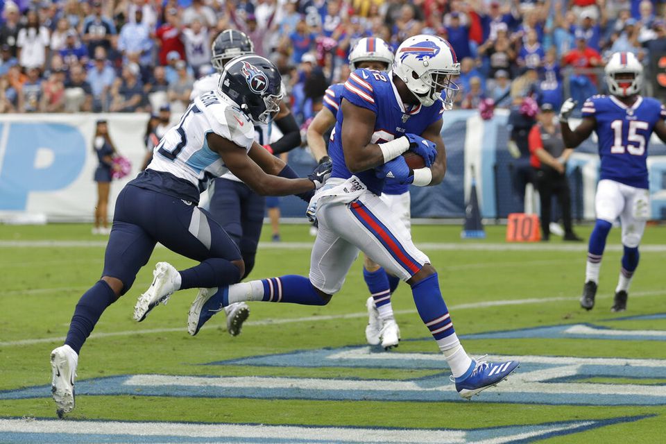 Bills hang on and defeat Titans, 14-7 (full coverage)