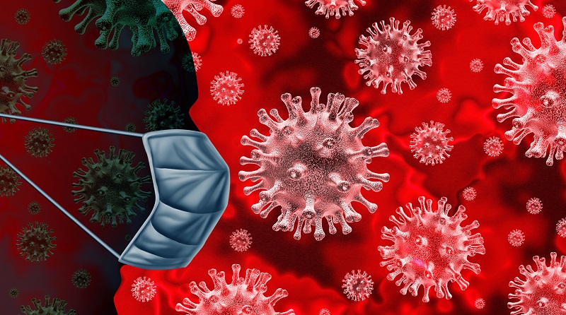 masked silhouette in front of COVID-19 virus variant Omicron