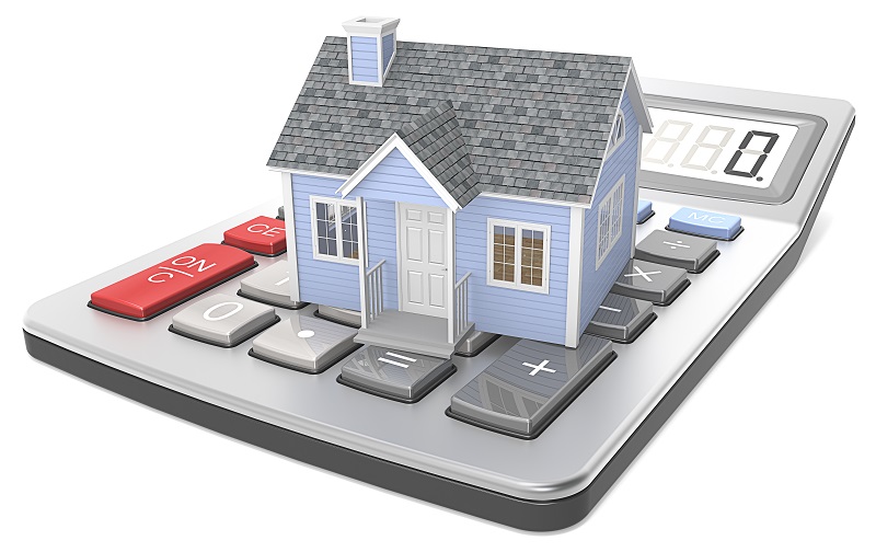 house sitting on calculator representing rental assistance