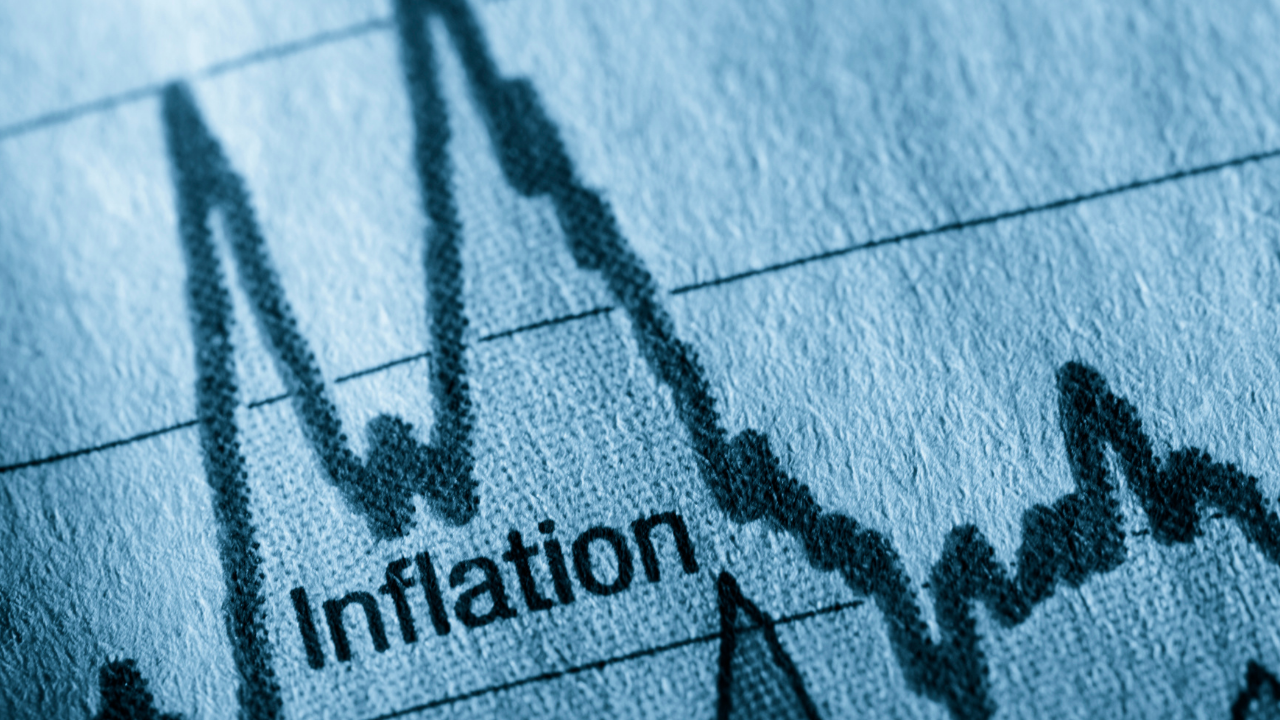 black and white print out image a chart with the word "inflation" typed in the center