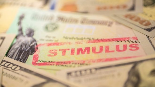 stimulus checks with red stamp