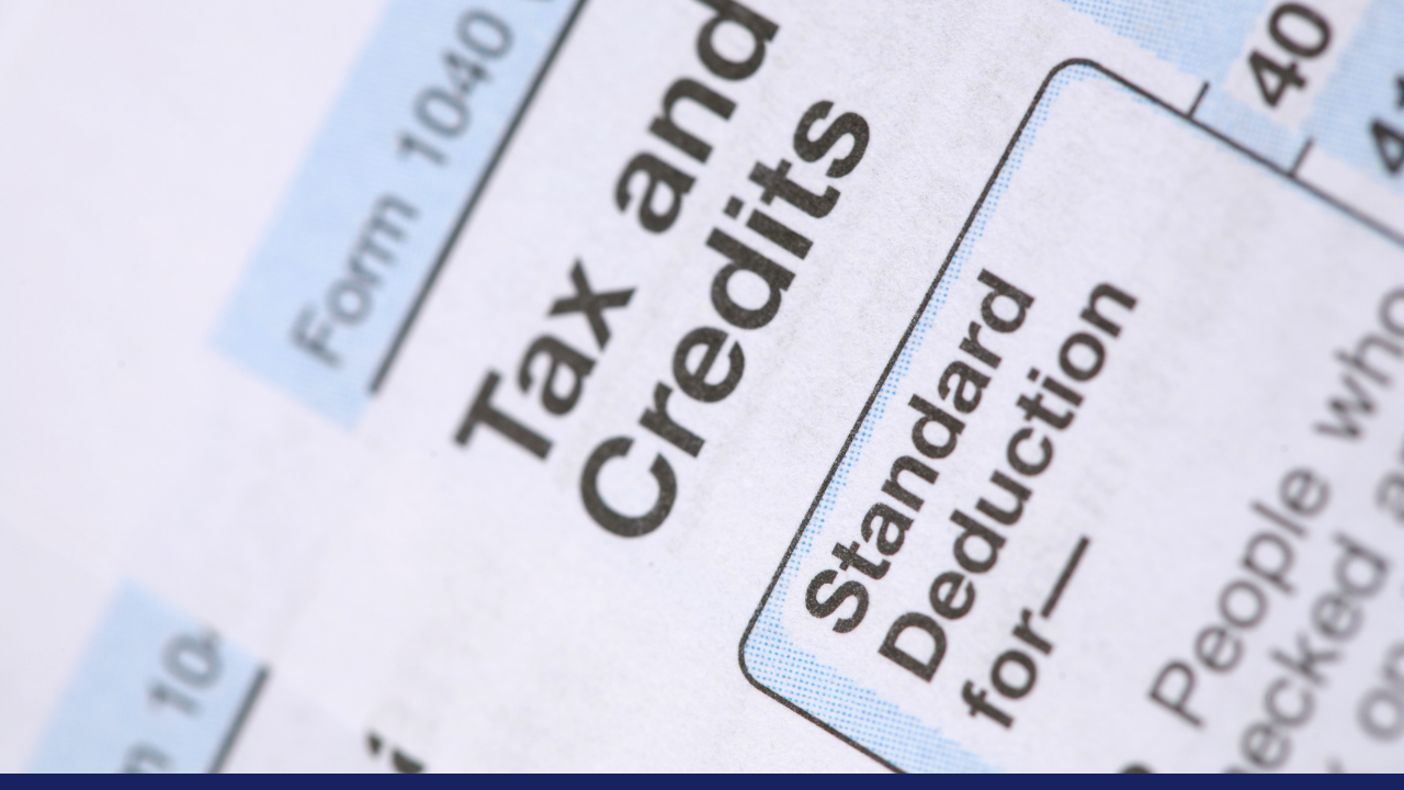 IRS tax filing form close up to the words "tax and credits"