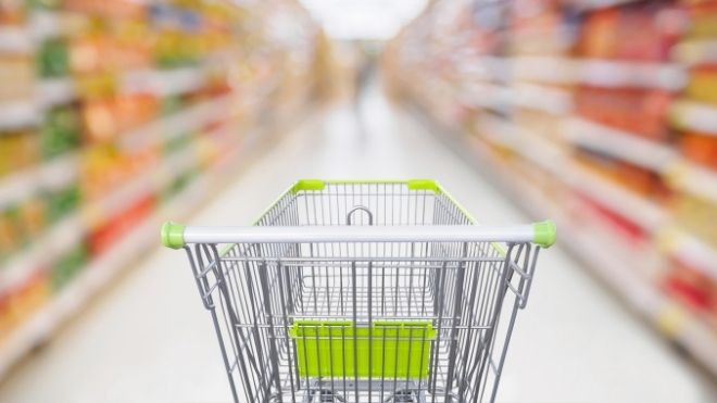 food stamp eligible items in a grocery aisle with a grocery cart
