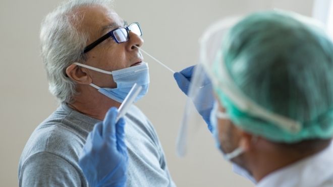  Man receives COVID-19 nasal swab test, but who is most effected by long COVID?