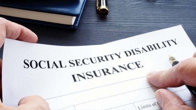 SSDI application being filled out for Social Security Administration program that pays disability