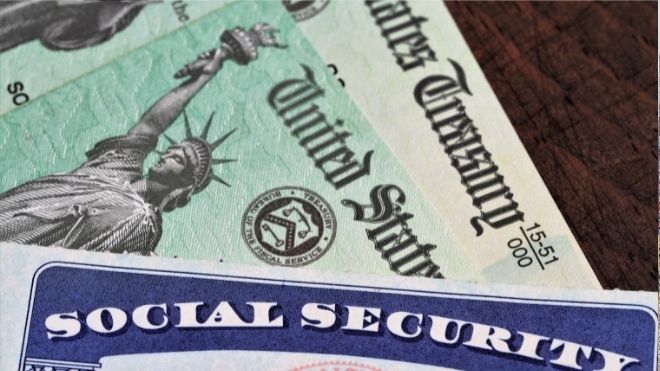 social security card with checks for social security payments