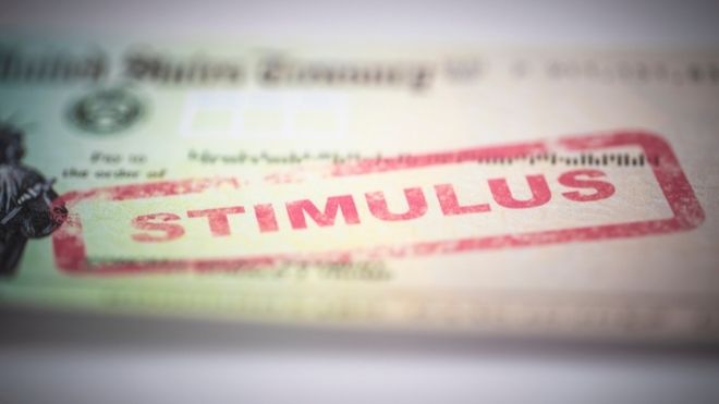 stimulus check stamped with the word "stimulus"