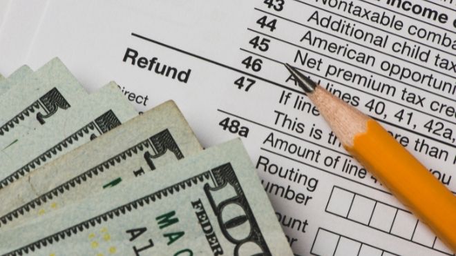 irs tax return form with cash from a tax refund