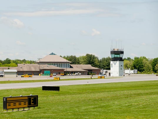 How can the Ithaca Tompkins International Airport become financially independent or grow service?