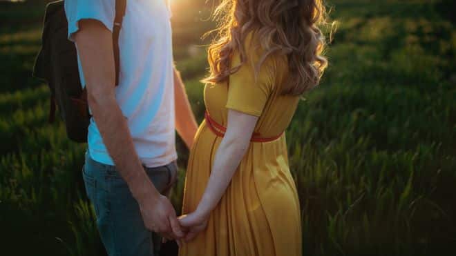 young people holding hands that reside in an area with high or low life expectancy.