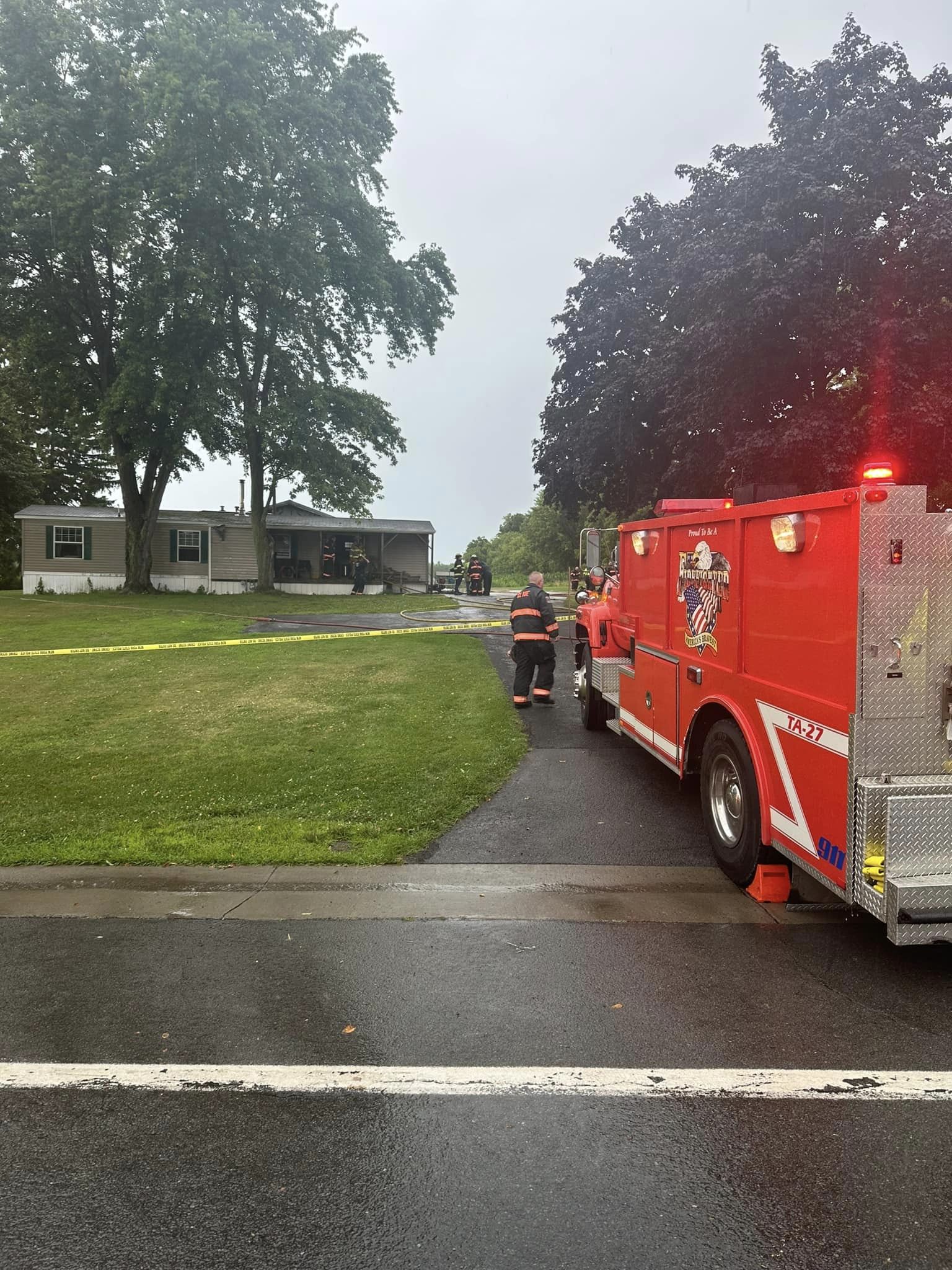 Firefighters battle garage and house fire in Clyde