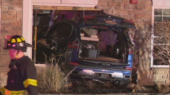 Car crashes into home; driver hospitalized Car crashes into home; driver hospitalized