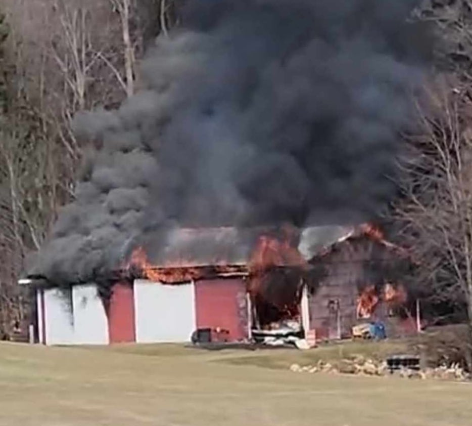 Crews battle barn fire near Route 176 in Cayuga County