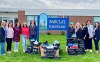 Reliant donates sneakers to Brockport elementary students