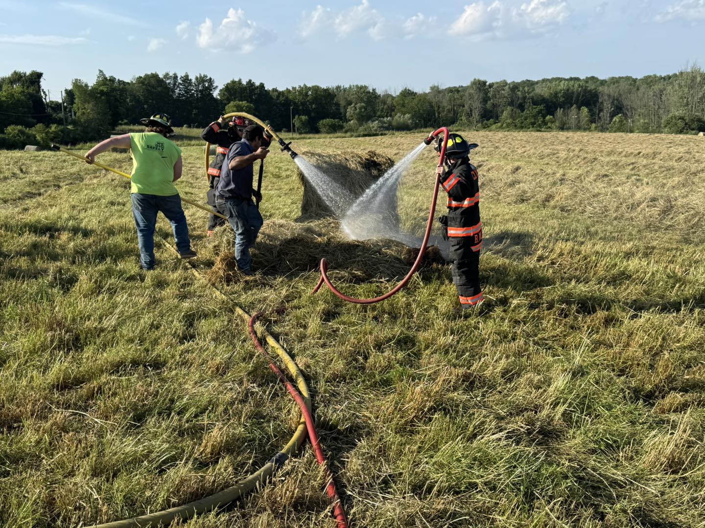 Clyde firefighters extinguish hay baler blaze Clyde firefighters extinguish hay baler blaze