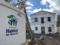 Yates Habitat starts 21st home build, celebrates tax reform win