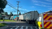 Tractor-trailer crash closes road in Locke