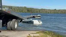 Car plunges into water at Cross Lake Marina; trooper, marina owner rescue occupant