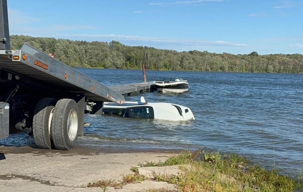 Car plunges into water at Cross Lake Marina; trooper, marina owner rescue occupant