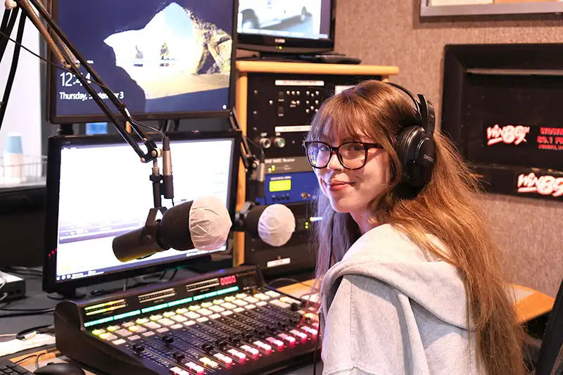 Cayuga student builds broadcasting experience on air and on the football field Cayuga student builds broadcasting experience on air and on the football field