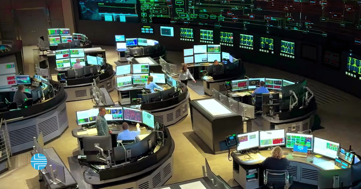 Operators at workstations in the NYISO electric-grid control room.